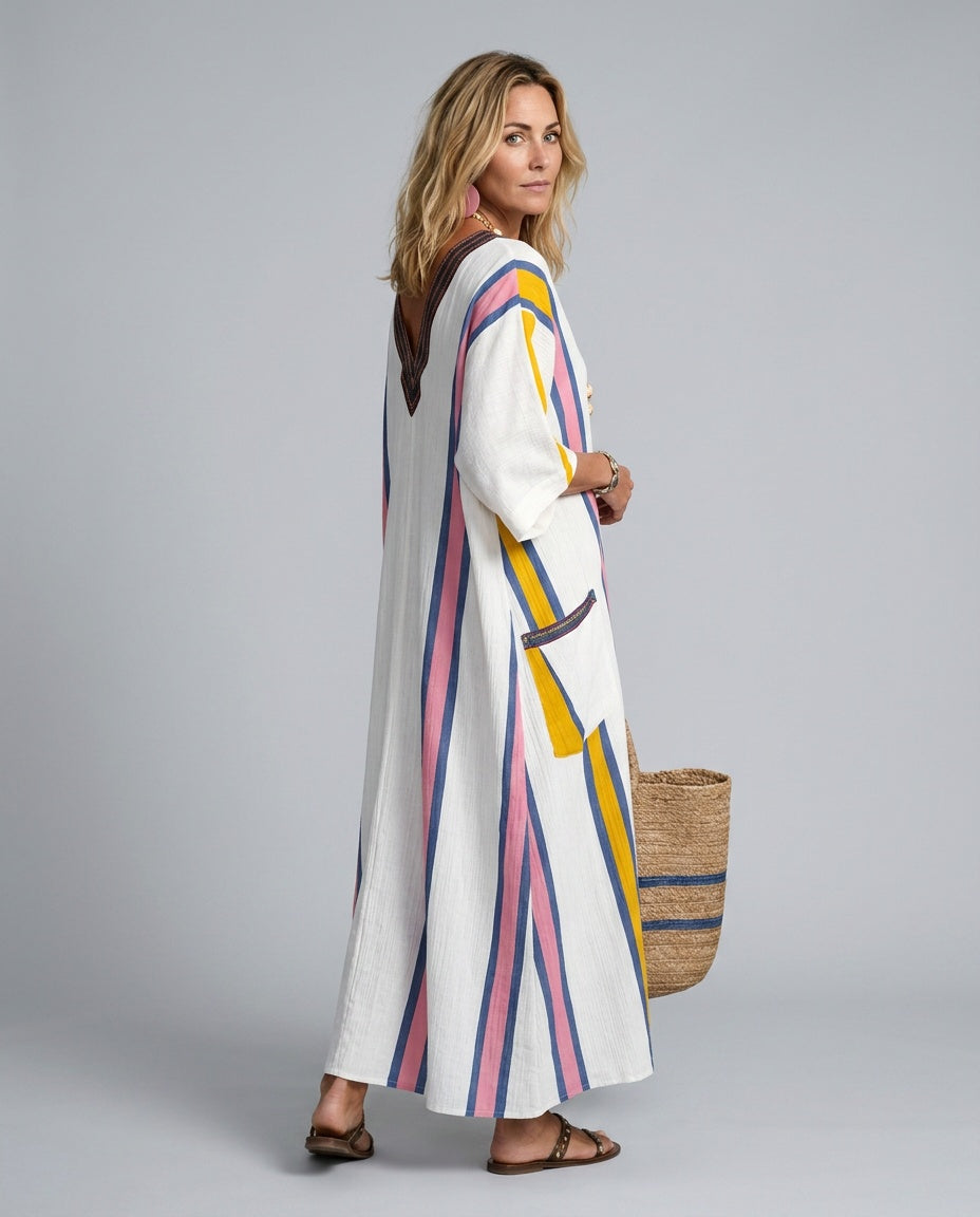 Effortless women's striped kaftan beach dress, a loose-fit maxi with V-neck, ideal for resort and holiday wear.