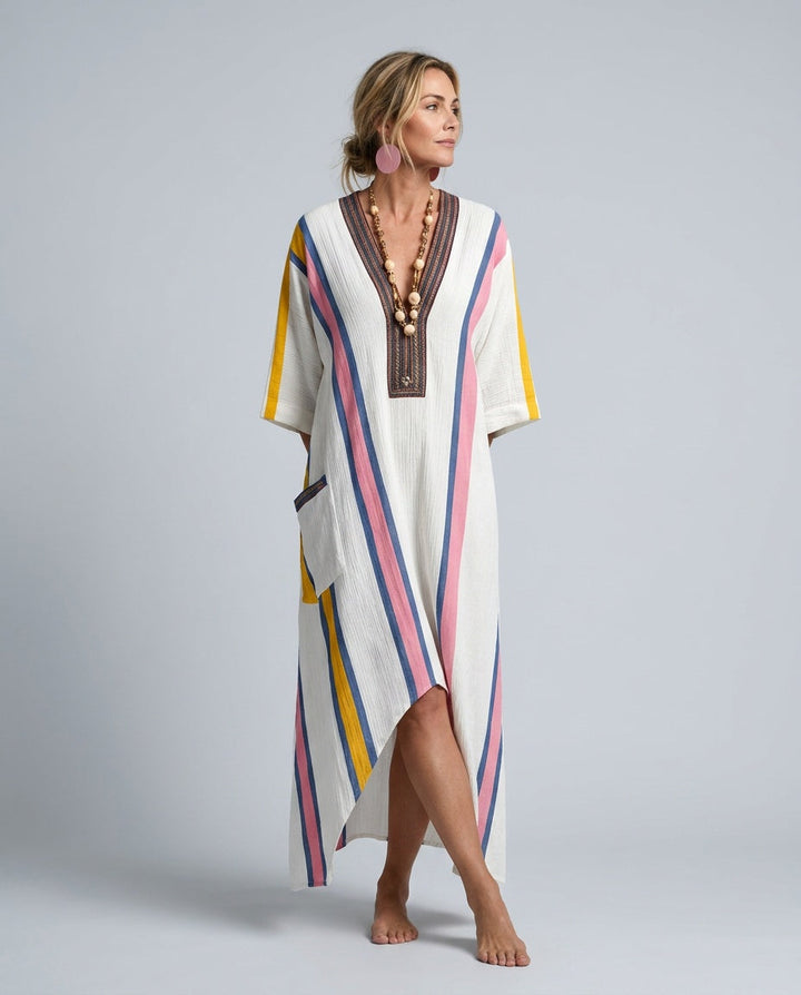 Flowy striped kaftan maxi dress for women, featuring a V-neck & three-quarter sleeves, great for beach & summer.
