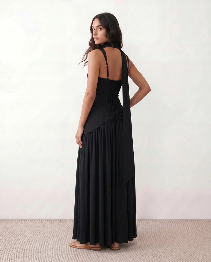 Glamorous women's races outfit: a lace-up corset maxi dress with a flattering thigh split for a striking look.