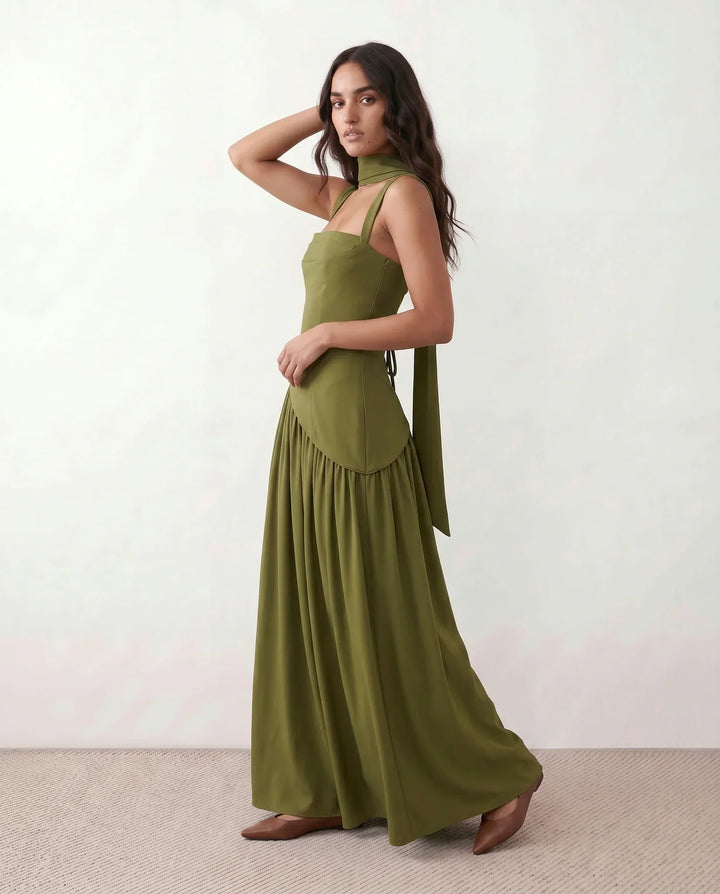 Stunning women's special occasion dress, a lace-up corset maxi with an alluring thigh split. Elegant silhouette.