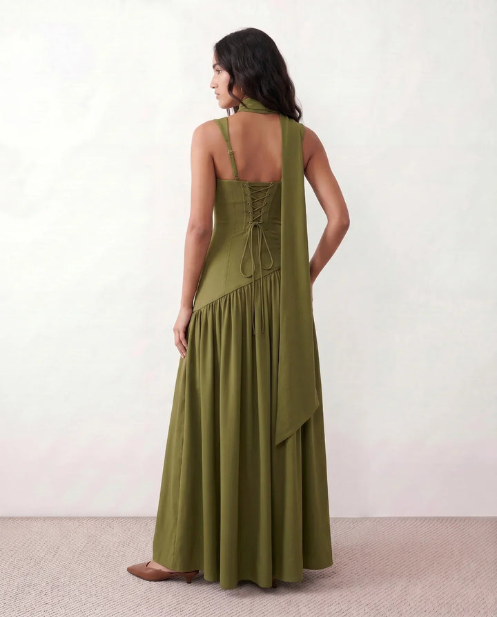 Women's elegant maxi dress featuring a structured corset top, lace-up detail, and a fashionable thigh split.