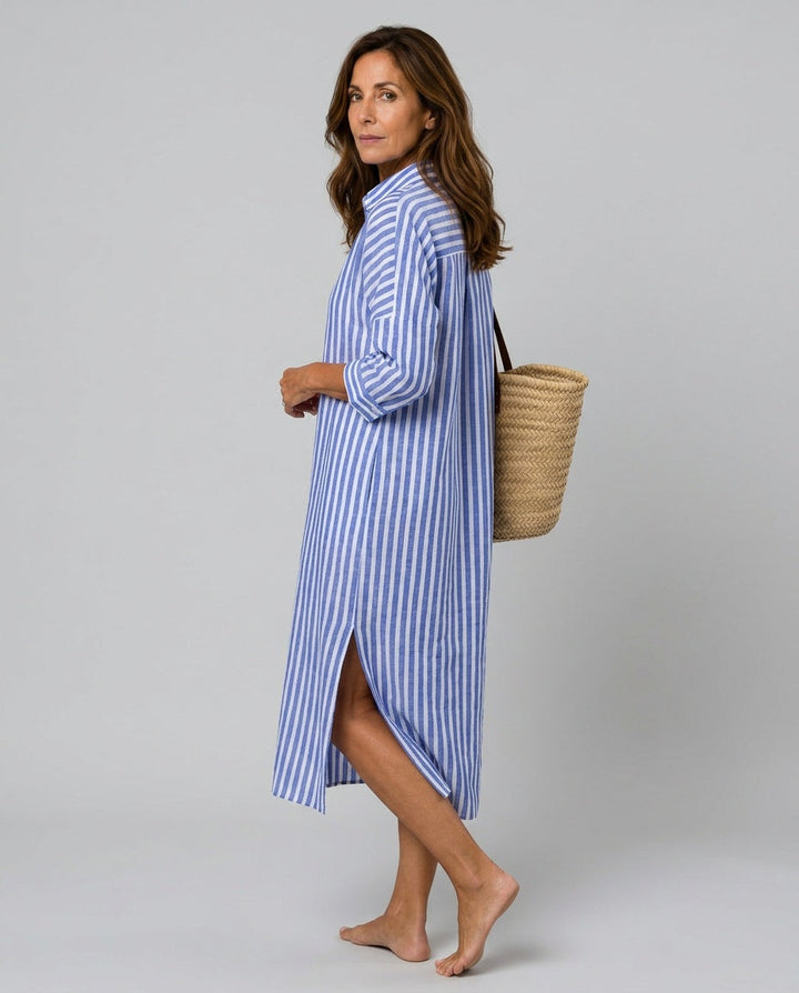 Flowy striped midi dress for women featuring a button-front closure and shirt collar, ideal for casual summer style.