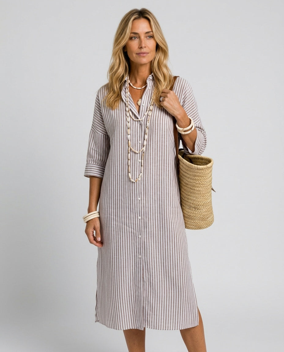 Stylish women's elegant striped midi dress with a sophisticated shirt collar and flowy silhouette for any season.