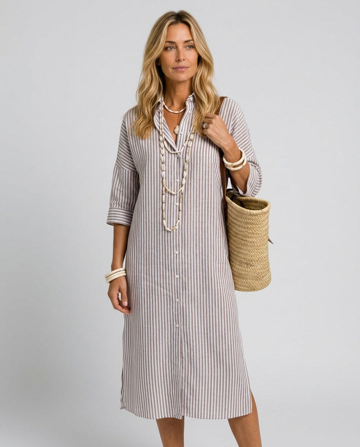 Stylish women's elegant striped midi dress with a sophisticated shirt collar and flowy silhouette for any season.