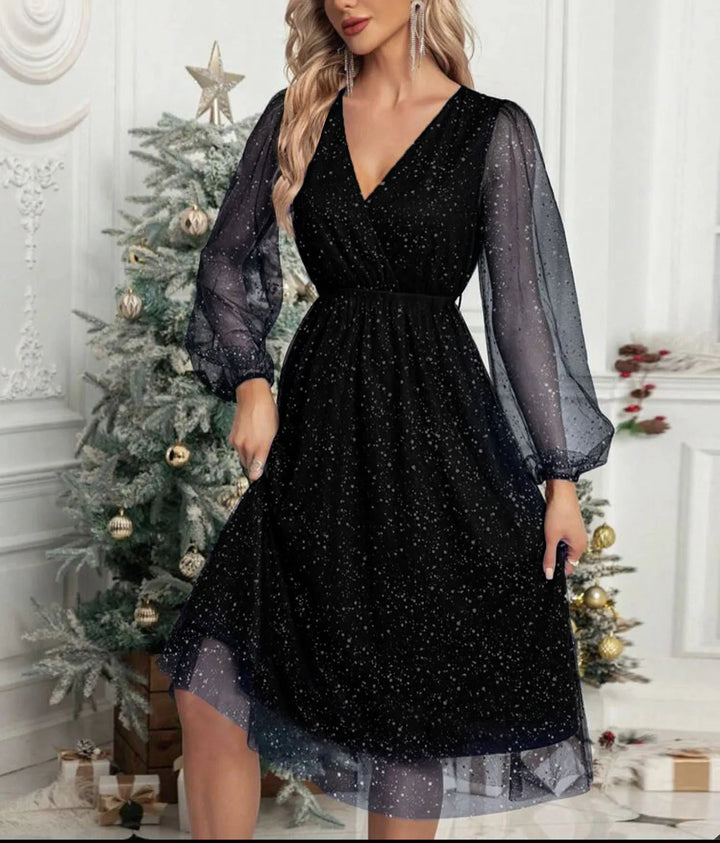 Women's glamorous mini party dress with shimmering mesh sleeves. Perfect elegant evening wear for special events.