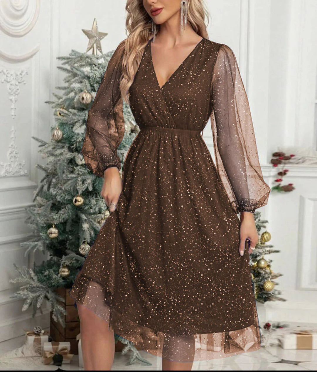 Sparkly women's mini party dress with shimmering mesh long sleeves. Ideal for elegant evening and cocktail wear.