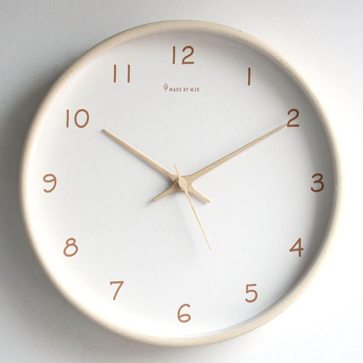 Silent solid wood analog wall clock, perfect minimalist home decor for living room or bedroom.