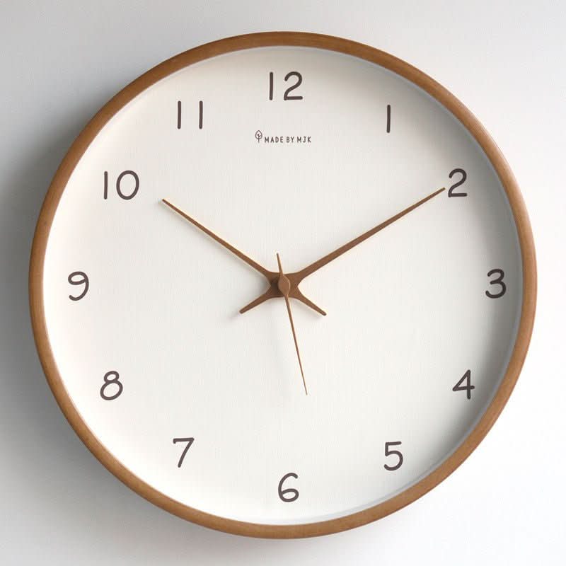High-quality solid wood wall clock with silent analog movement, ideal for quiet home or office decor.