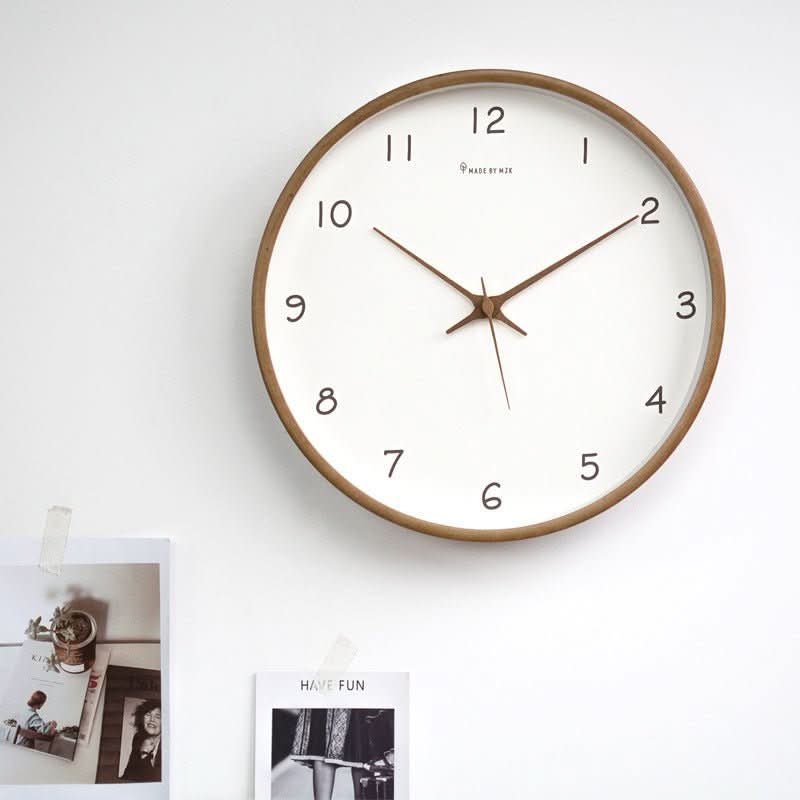 Quiet wall clock made of beautiful solid wood, enhancing living room decor with its minimalist design.
