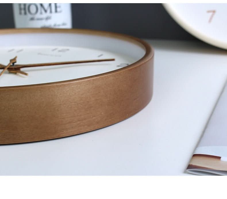 Detailed view of the grain on the solid wood silent wall clock, a minimalist and functional art piece.