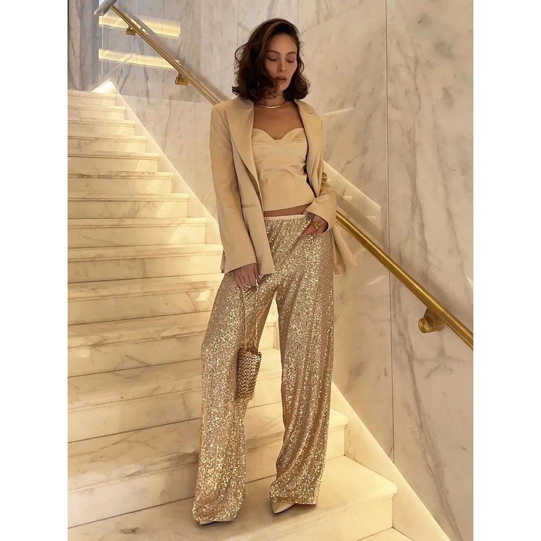 Stylish silver sequin trousers for women, designed with a dazzling shimmer. Elevate your evening or party look.