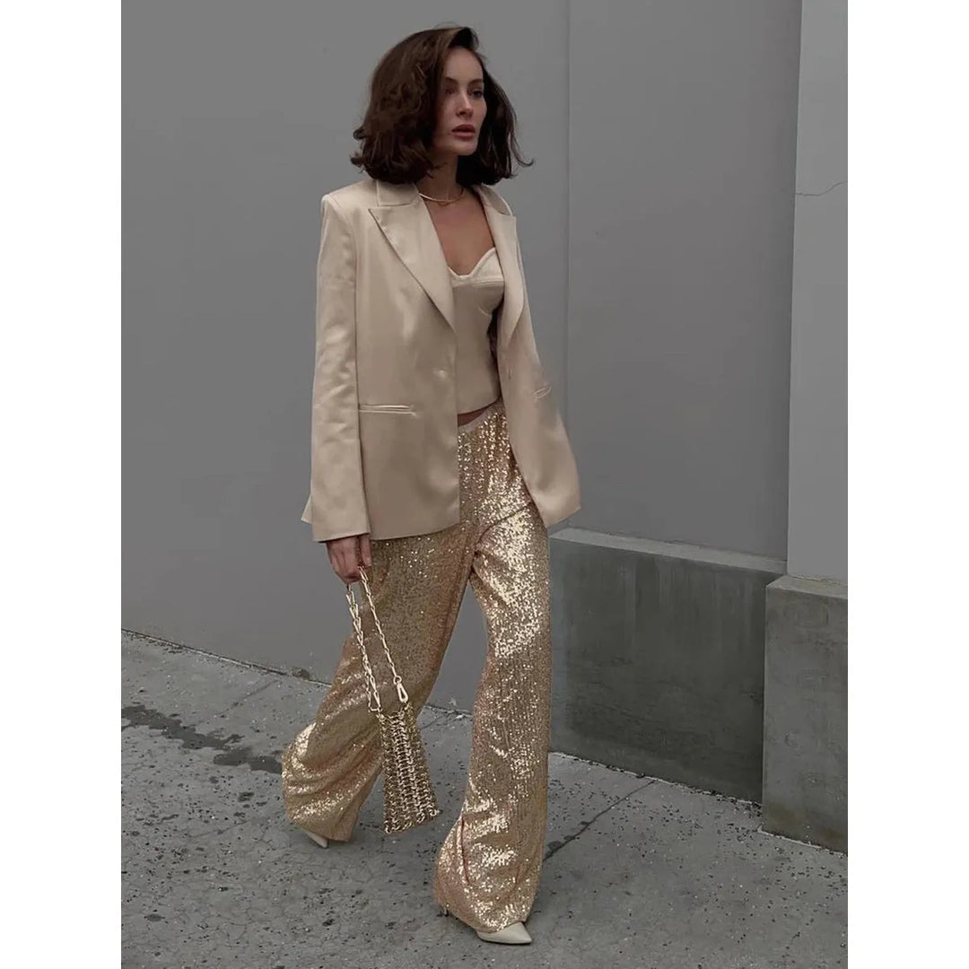 Fashionable women's sequin pants, designed to shimmer and shine. Silky trousers ideal for making a glamorous statement.