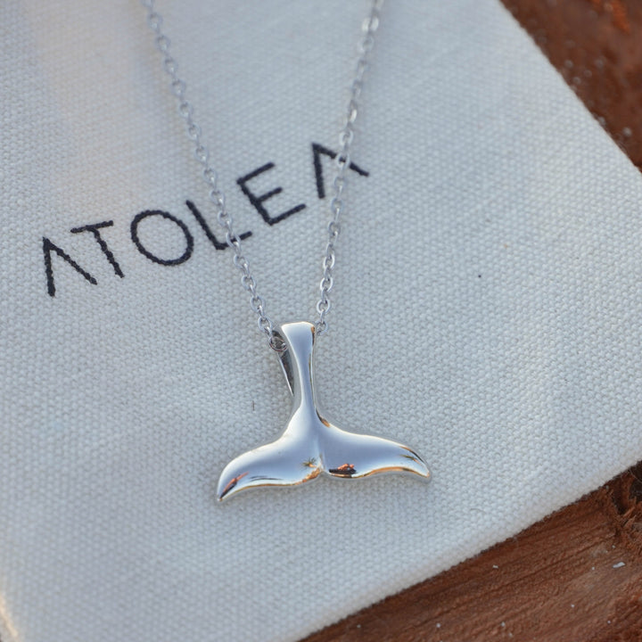 Elegant gold whale tail necklace, perfect jewelry for her, sea-themed.