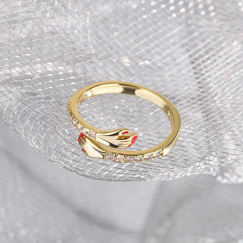 Symbolic adjustable hug ring, representing love, connection & healing comfort for all.