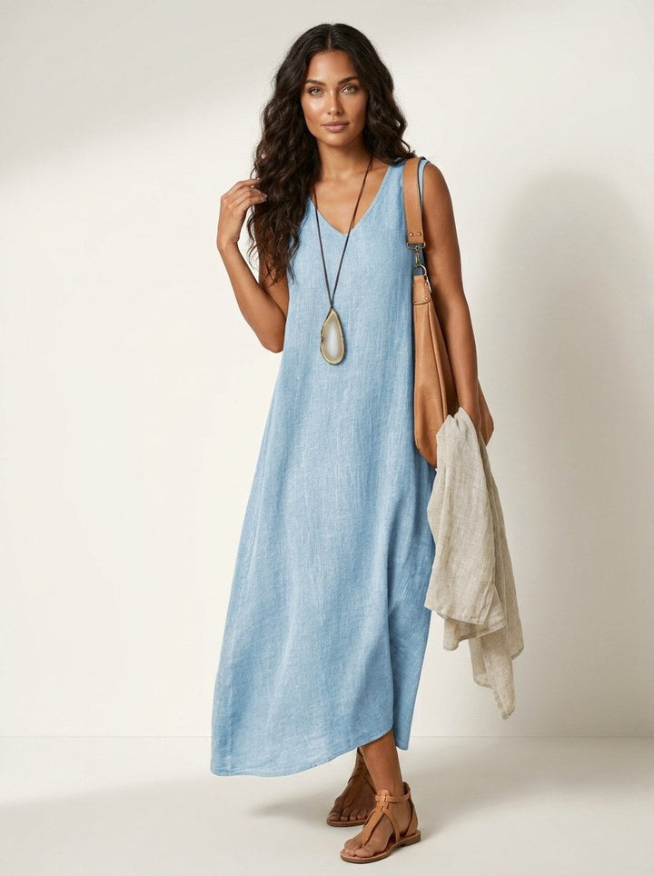 Elegant women's V-neck sleeveless flowing maxi dress in a comfortable, breathable fabric, perfect for summer.