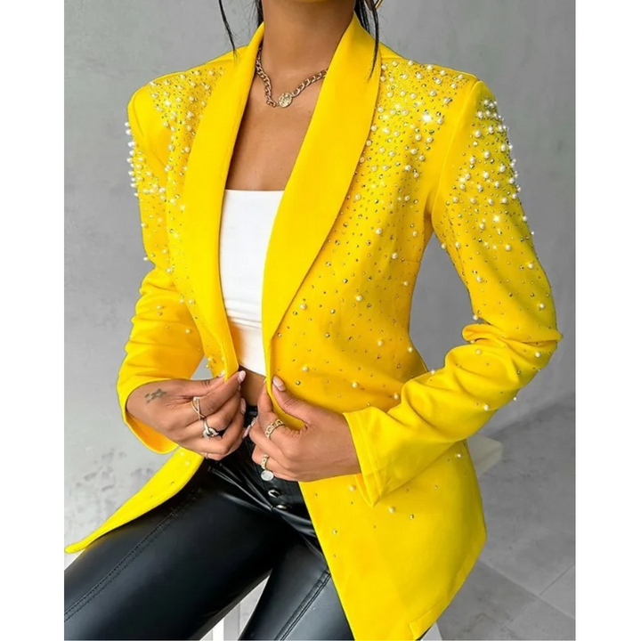 Elegant women's slim-fit blazer with delicate pearl embellishments, perfect for office or formal wear.