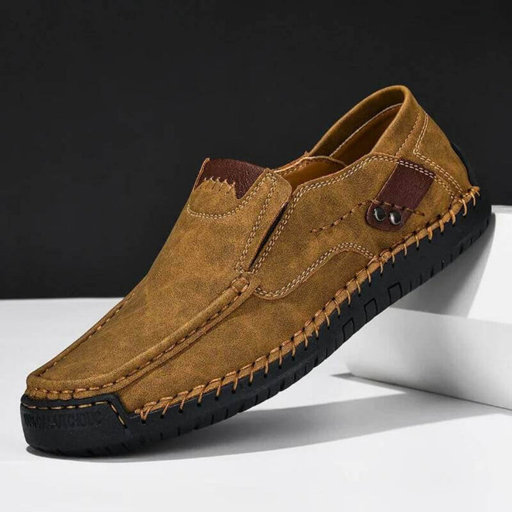 Casual men's slip-on shoes with excellent arch support, offering comfort & easy wear for daily walking.