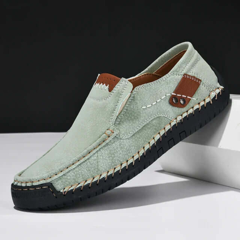 Durable men's slip-on shoes with supportive arch support, perfect for comfortable everyday walking & versatile wear.