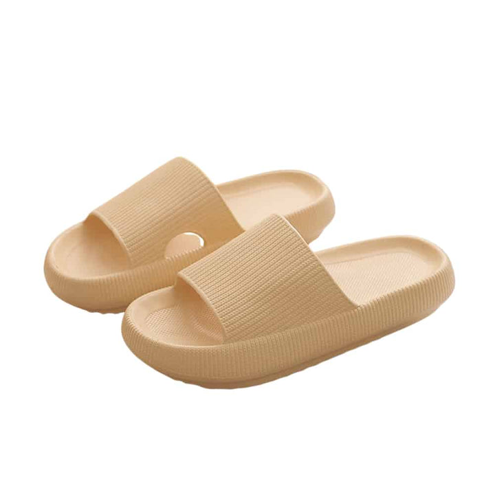 Women's comfort footwear: Non-slip slides, soft cloud slippers. Cushioned for casual indoor/outdoor wear.