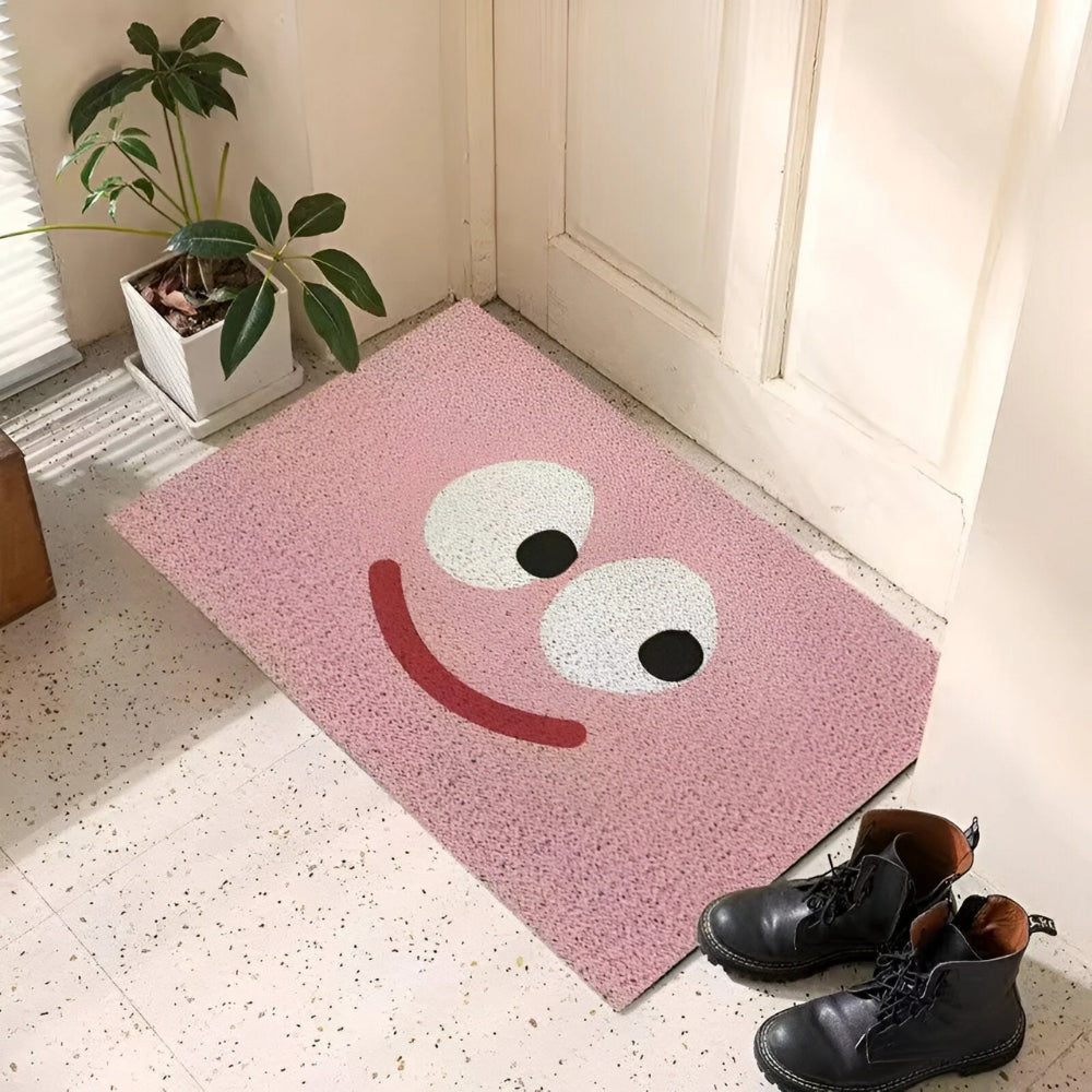 Indoor/outdoor welcome mat with a friendly smiley face. Non-slip entrance doormat, adds cheerful home decor.