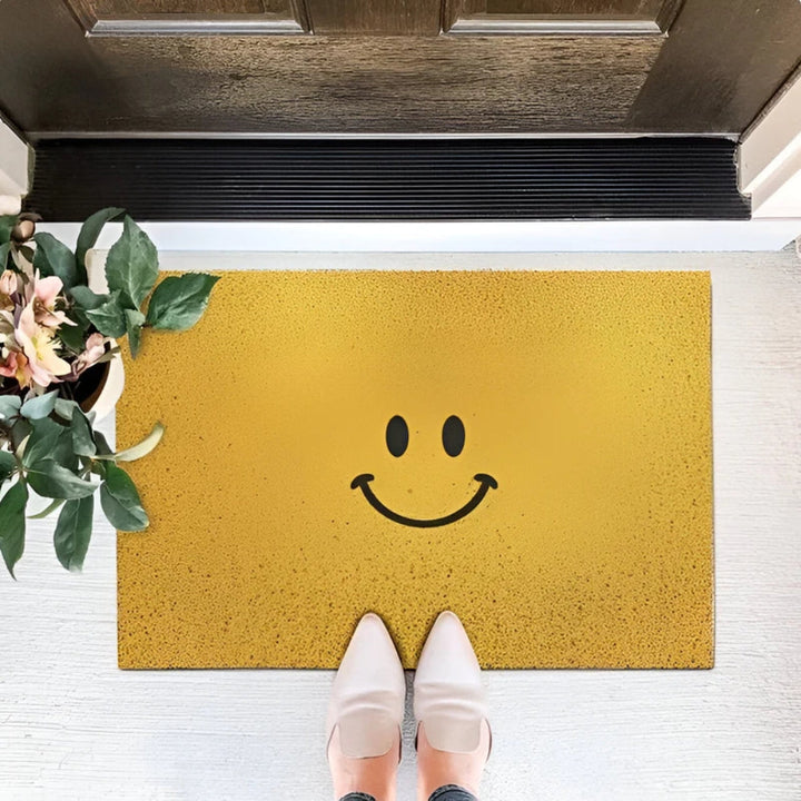 Durable smiley face doormat, an inviting non-slip welcome mat for any home. Suitable for indoor & outdoor.