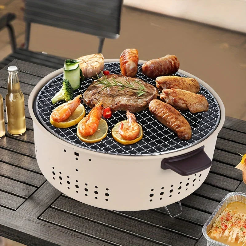 Compact portable smoke-free charcoal grill, ideal for camping, picnics, and small outdoor spaces like balconies.