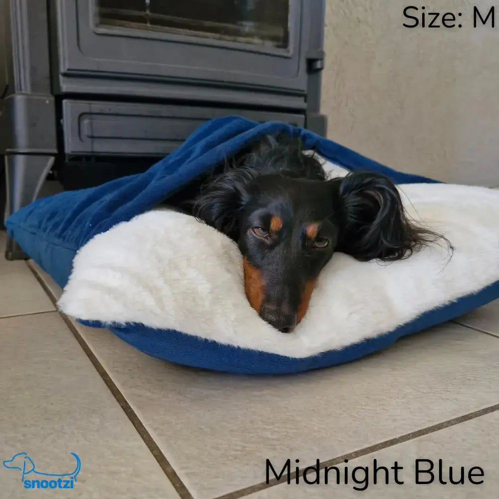 Anxiety relief CuddleNest dog bed. Soft, cozy burrow pet bed with integrated comfort wrap for ultimate pet comfort.