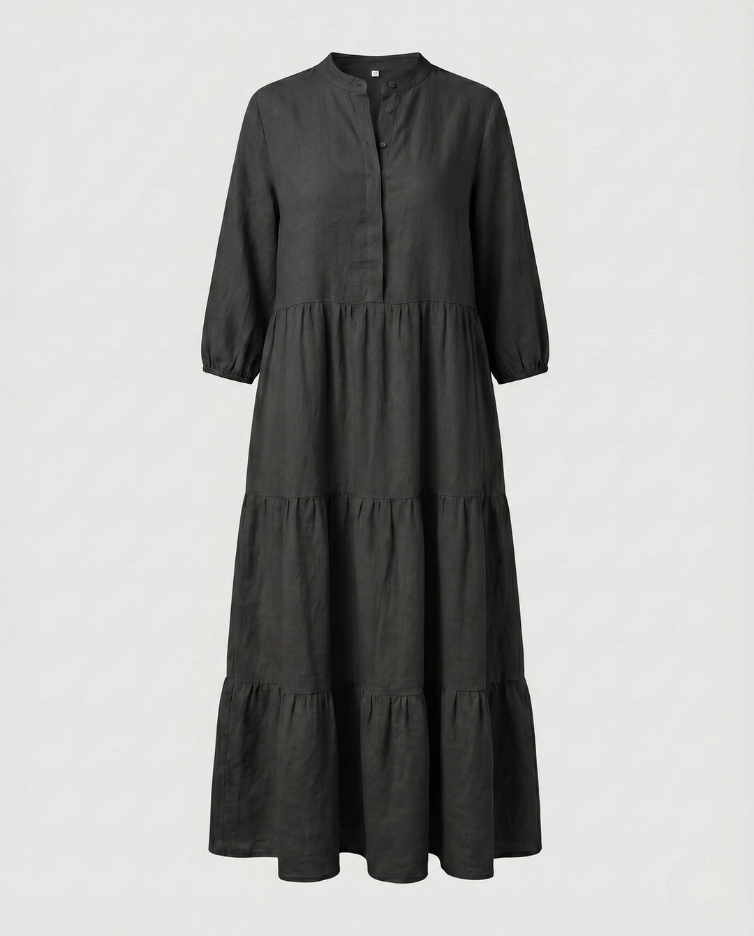 Stylish women's tiered midi dress, suitable for various occasions, with a distinctive button placket.