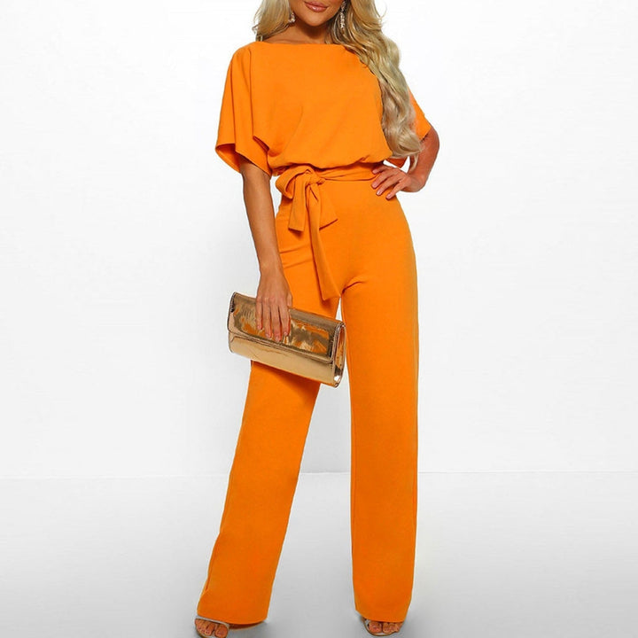 Women's sophisticated black belted wide-leg jumpsuit, perfect for elegant evening wear or a wedding guest outfit.