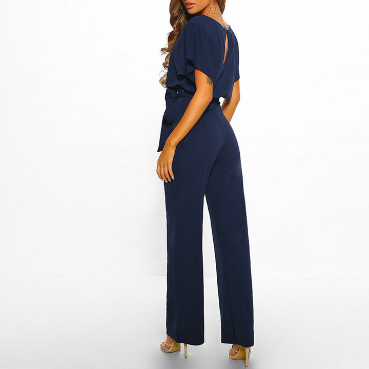 Modern formal jumpsuit for women, featuring a chic wide-leg cut and a stylish cinched belted waist.
