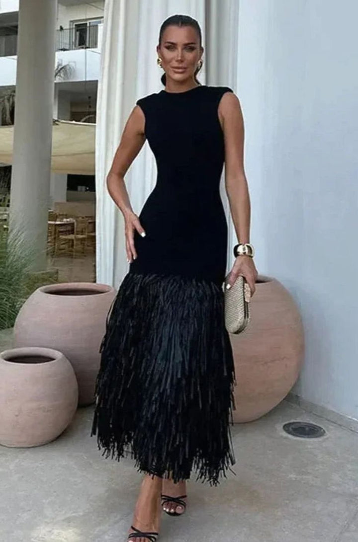 Women's stylish black fringe hem fitted cocktail dress, perfect for parties & special occasions.