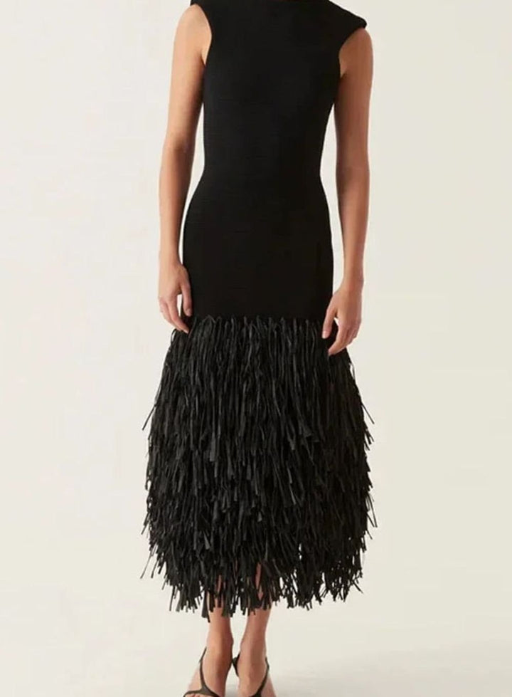Chic black women's fitted cocktail dress featuring a trendy fringe hem, perfect for any special occasion.