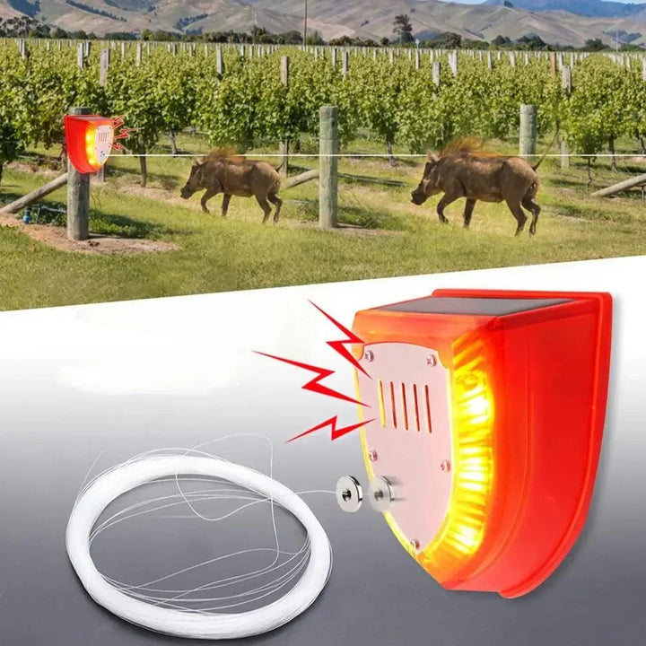 Solar motion activated animal repellent provides weatherproof outdoor security, a humane wildlife deterrent.
