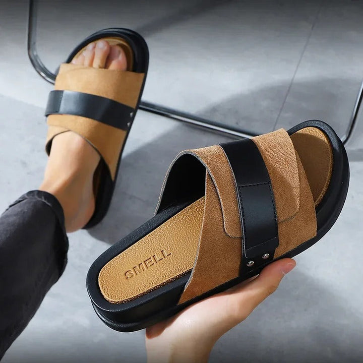 Comfortable men's slides with stylish buckle strap, ideal for relaxed poolside and everyday wear.