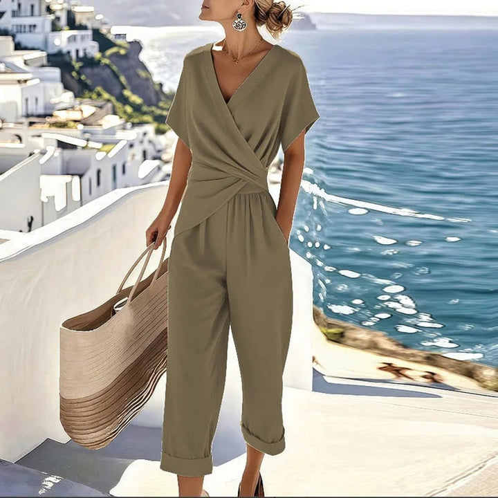 Versatile women's khaki elegant wrap top and tailored trousers two-piece set, ideal for sophisticated summer outfits.