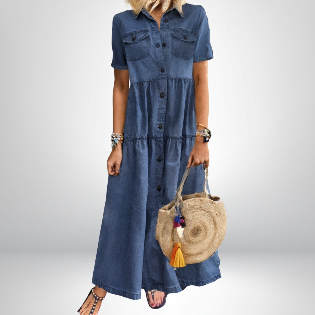 Women's chic blue denim shirt dress with button-front, tiered skirt, perfect for casual summer wear.