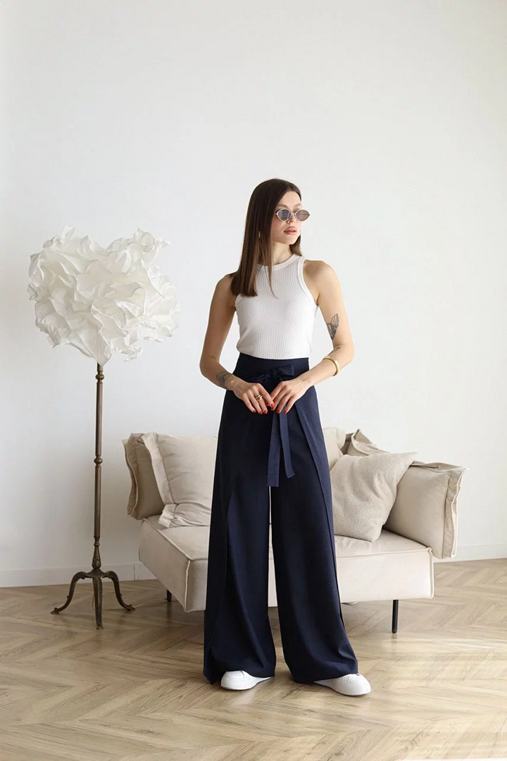 High-waisted flowy wide-leg pants for women, featuring a trendy and flattering tie-waist design.