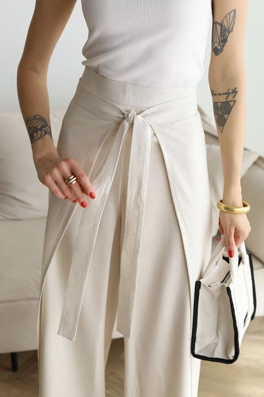 Versatile elegant wide-leg pants for women with a tie waist, suitable for casual chic or dressy occasions.