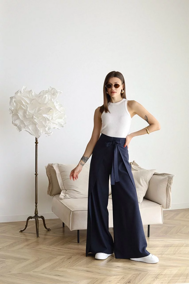Modern women's elegant wide-leg pants, featuring a chic tie waist and comfortable fit for a sophisticated style.