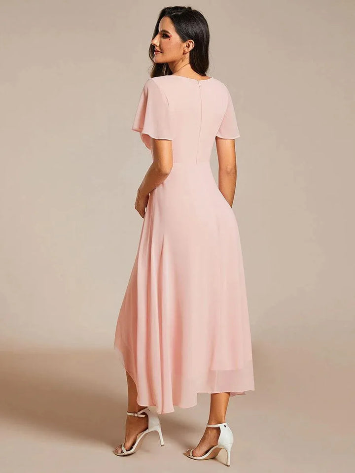 Beautiful women's wrap V-neck midi dress with an elegant high-low hem for garden parties.