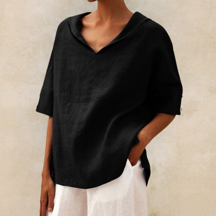 Effortless women's sophisticated V-neck top, relaxed loose fit with half sleeves for versatile casual and office wear.