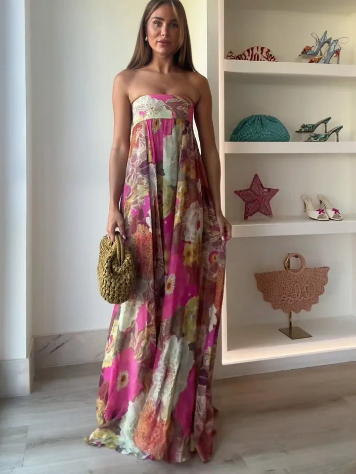 Women's elegant floral strapless maxi cocktail dress, perfect for wedding guests & garden parties.