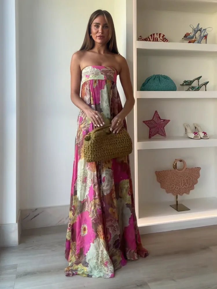 Flowing women's floral strapless maxi dress, an elegant choice for cocktail events & celebrations.