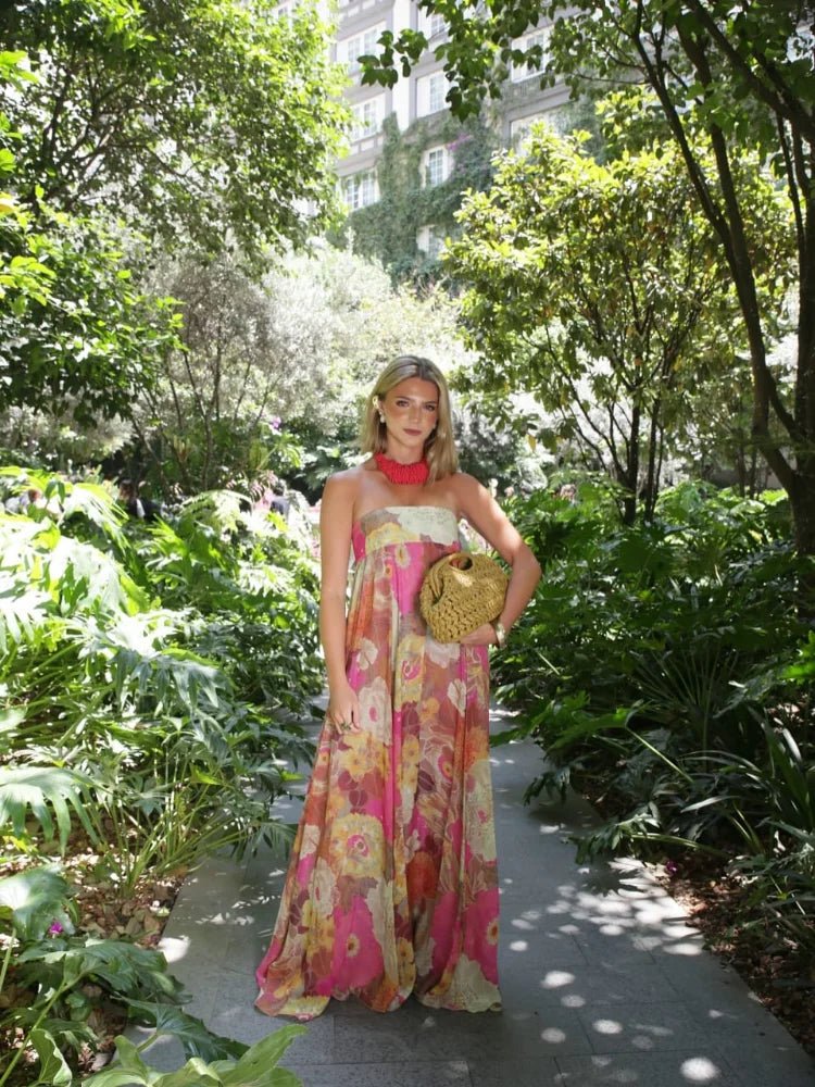 Women's sophisticated floral strapless maxi dress, a flowing & stylish cocktail or party attire.