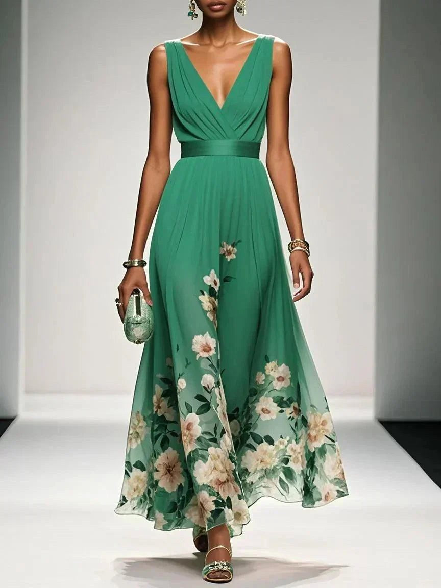 Back view of elegant women's floral V-neck A-line midi dress, showing graceful midi length.