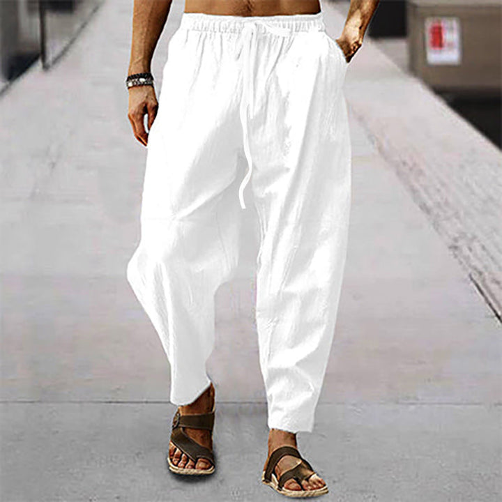 Men's modern relaxed fit drawstring pants in a versatile color, perfect for casual, comfortable summer wear.