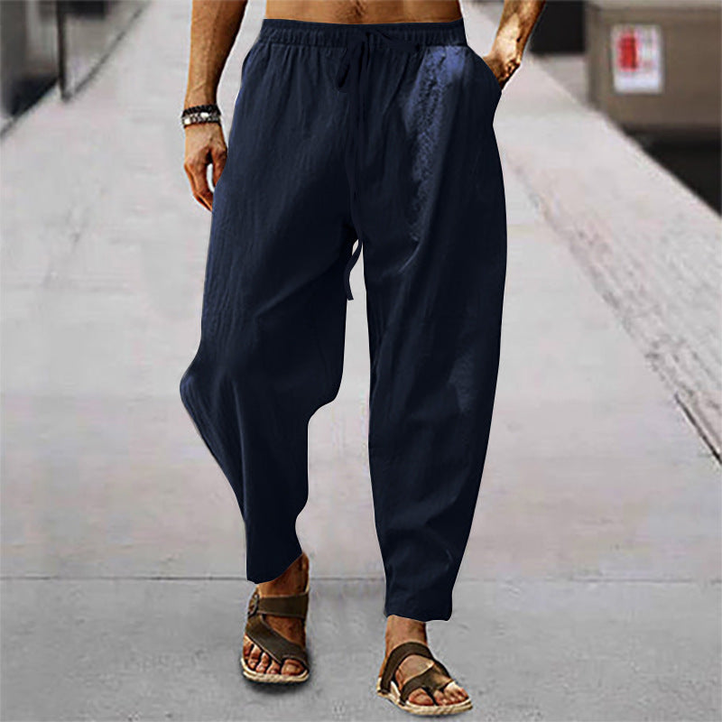 Lightweight tapered drawstring pants for men, offering modern style & versatility for summer activewear.
