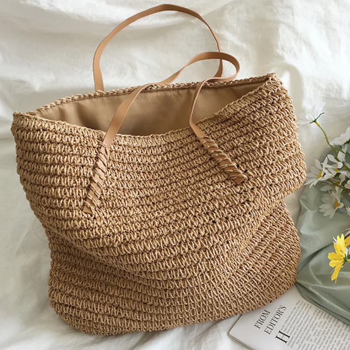 Women's stylish shoulder bag, spacious and versatile, featuring a unique woven design for daily carry.