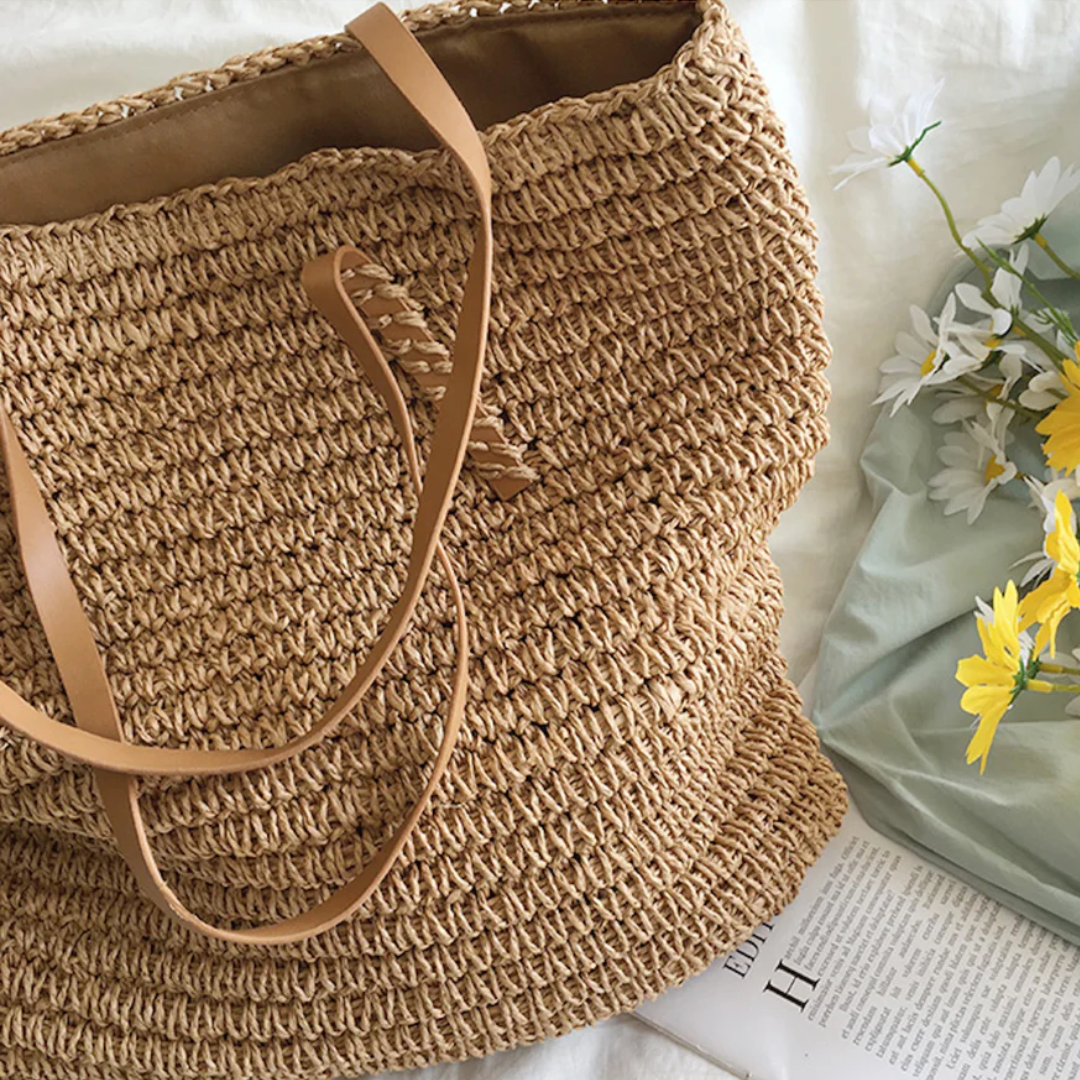 Chic white women's large capacity shoulder bag with sturdy strap, perfect for daily use.