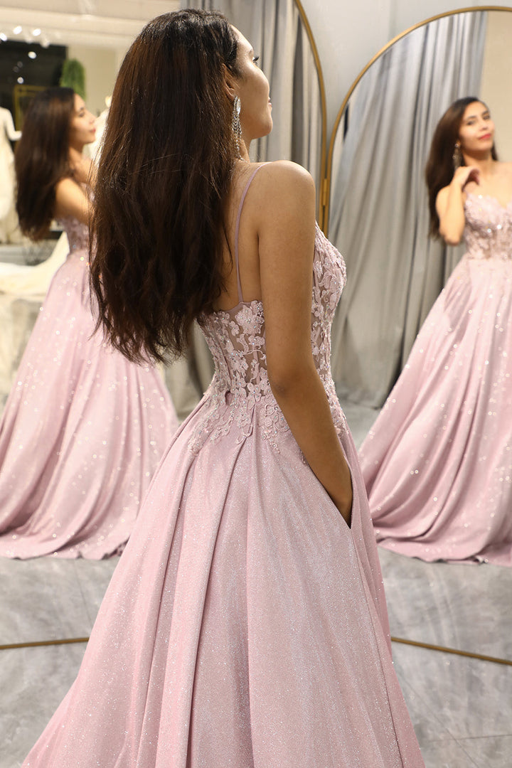 Elegant blush pink sparkling A-line ball gown for prom, gala, or formal events; features V-neck design.